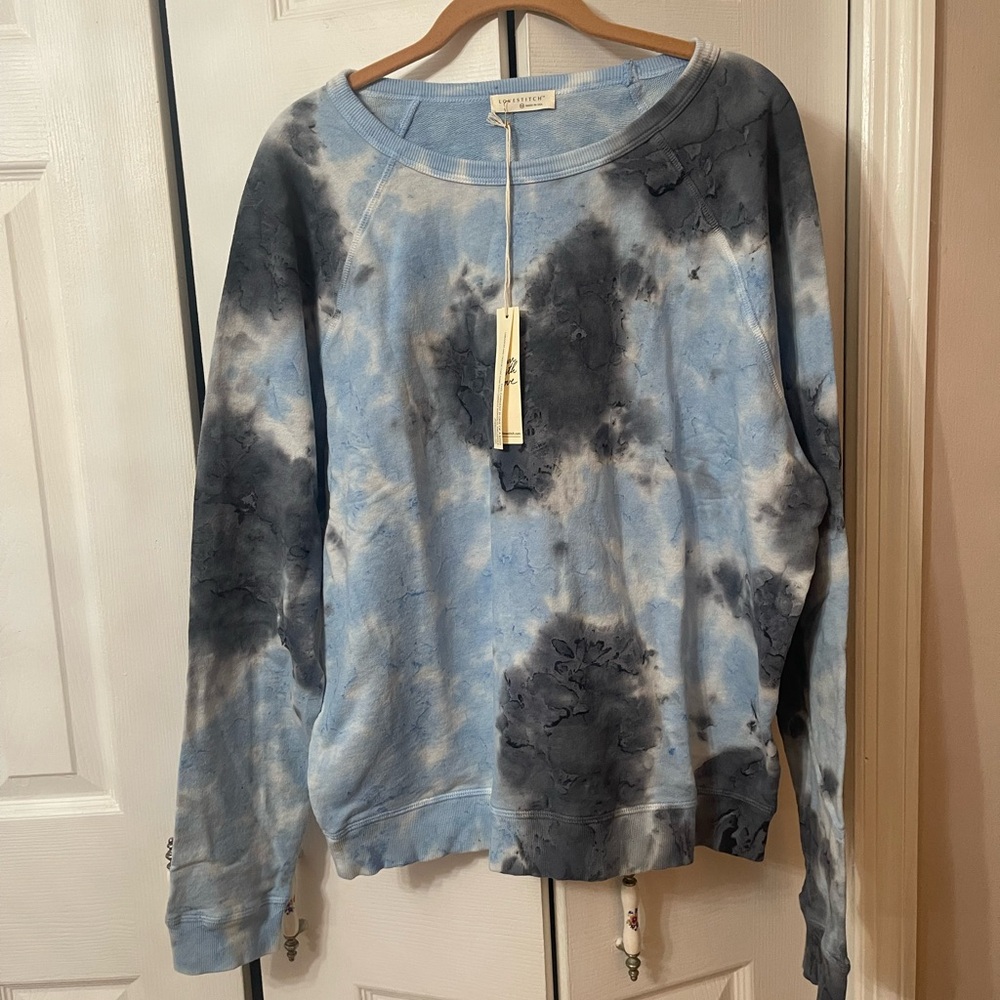 NWT Love stitch tie-dye sweatshirt size Medium
PTP 25 Length 26